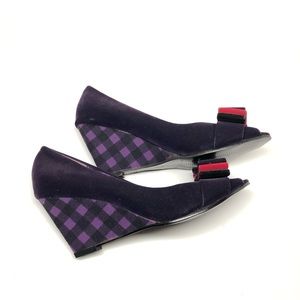 Purple open-toe wedges with purple & red bow.